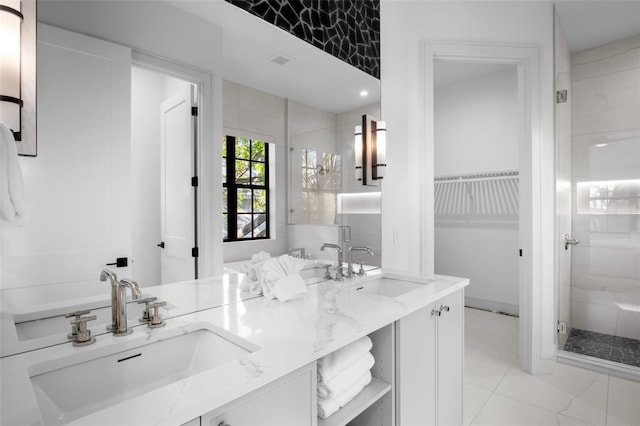 bathroom with vanity and walk in shower