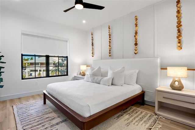 bedroom featuring ceiling fan and light wood-type flooring