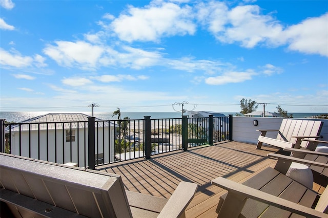 wooden terrace with a water view