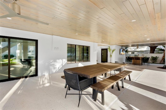 dining room with wooden ceiling