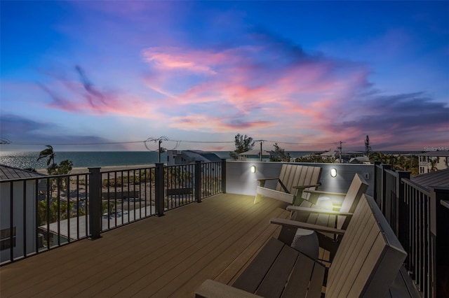 deck at dusk with a water view