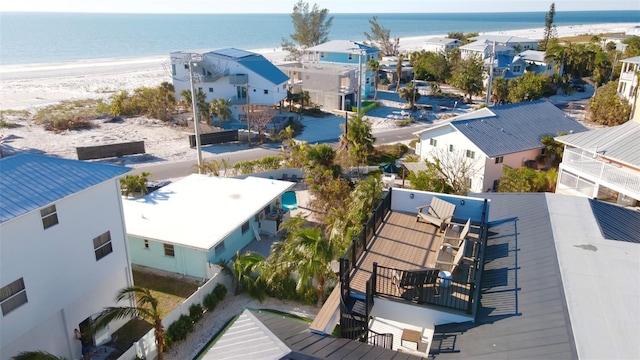 bird's eye view with a view of the beach and a water view