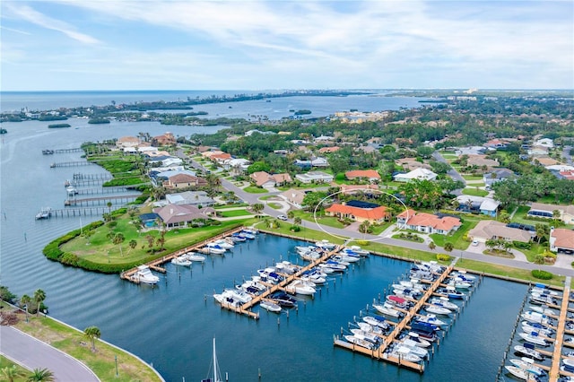 drone / aerial view with a water view