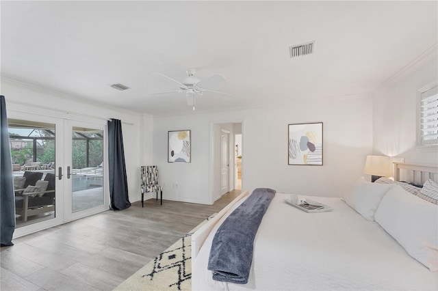 bedroom featuring ceiling fan, french doors, access to outside, hardwood / wood-style flooring, and ornamental molding