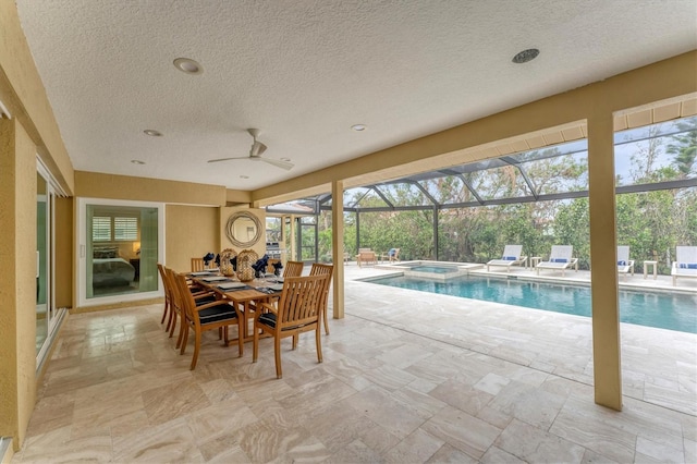 view of swimming pool featuring ceiling fan