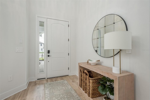 entryway with light wood-type flooring