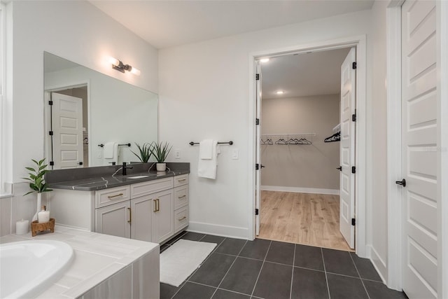 bathroom featuring tile patterned floors and vanity