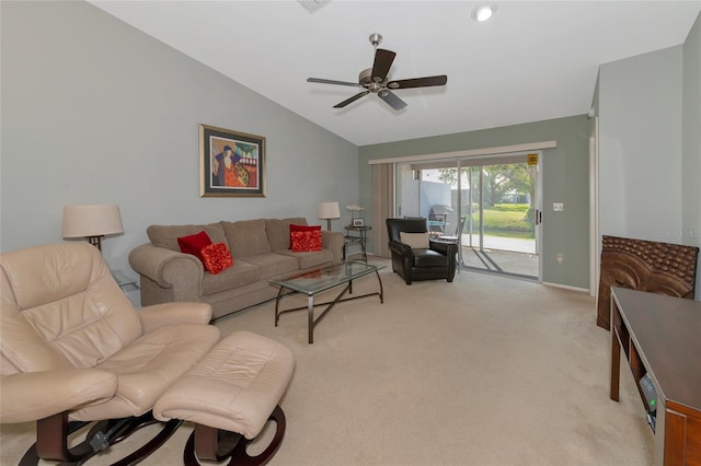 living room featuring light colored carpet, vaulted ceiling, and ceiling fan