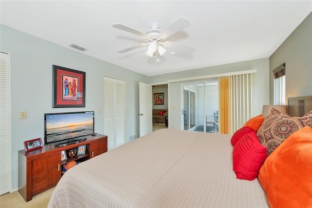 carpeted bedroom with access to exterior and ceiling fan