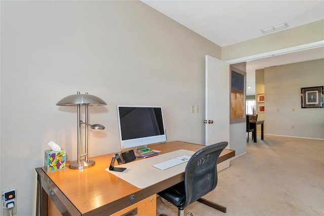 office area featuring light colored carpet