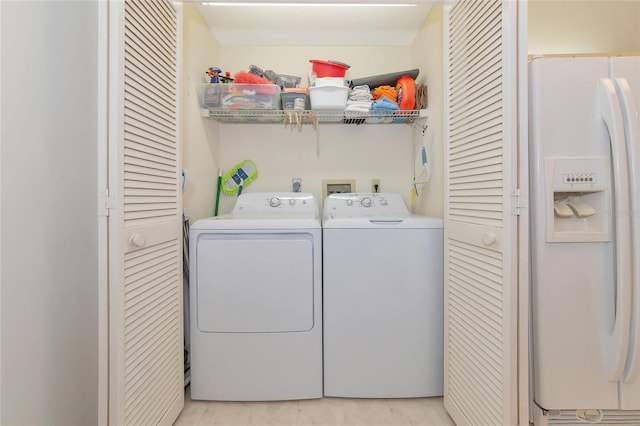 laundry area featuring washing machine and dryer