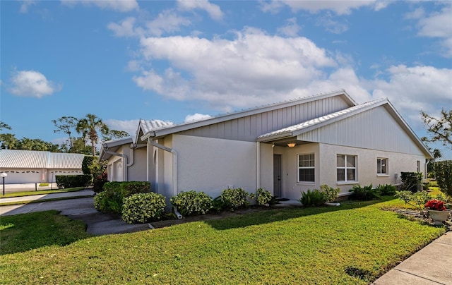 view of front of home with a front yard