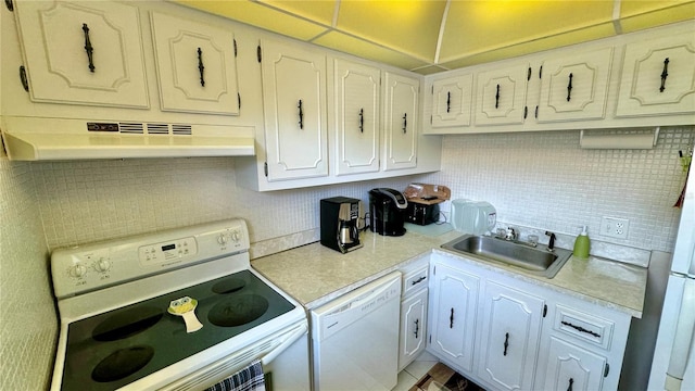 kitchen with white cabinetry, sink, exhaust hood, and white appliances