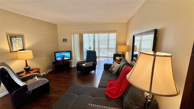 11485 Oakhurst Rd Unit 200-220, Largo, FL 33774 - living room with wood finished floors, a textured ceiling, and baseboards