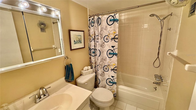 full bathroom with tile patterned flooring, vanity, toilet, and shower / bath combo with shower curtain