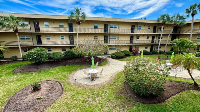 11485 Oakhurst Rd Unit 200-220, Largo, FL 33774 - view of property's community with a yard