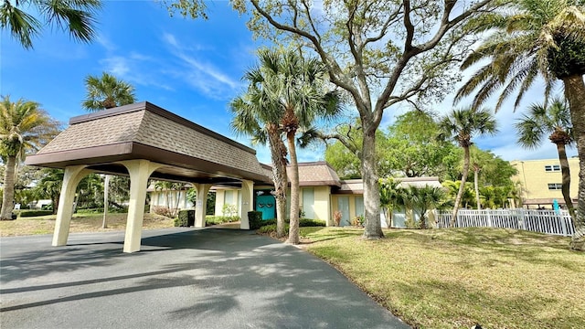 view of property's community featuring a yard