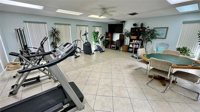 11485 Oakhurst Rd Unit 200-220, Largo, FL 33774 - workout area with ceiling fan and light tile patterned flooring