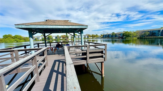 view of dock with a water view