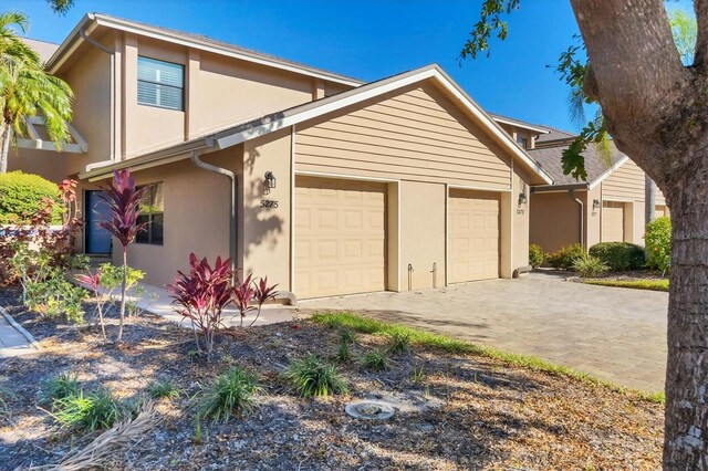 view of front of home with a garage