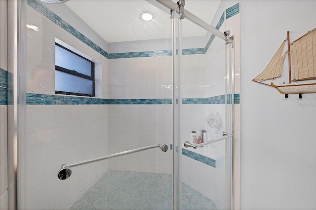 bathroom featuring an enclosed shower