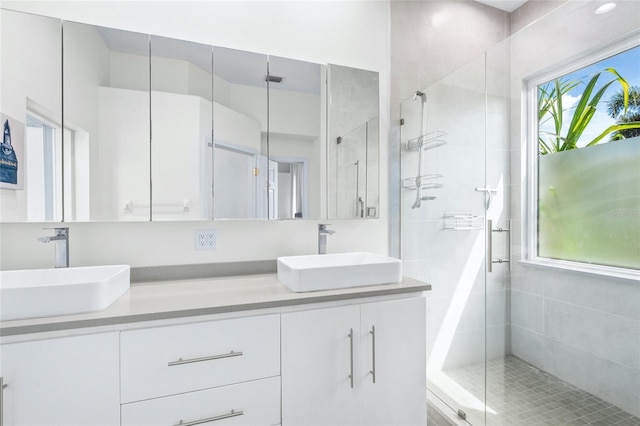 bathroom with vanity and an enclosed shower