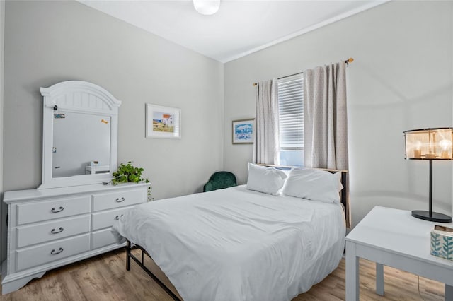 bedroom featuring light hardwood / wood-style floors