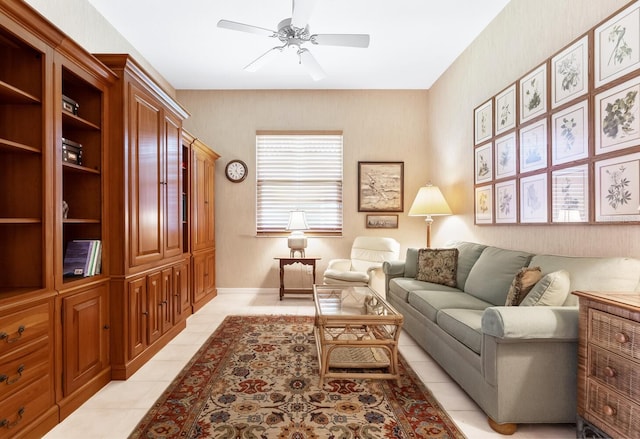 tiled living room featuring ceiling fan