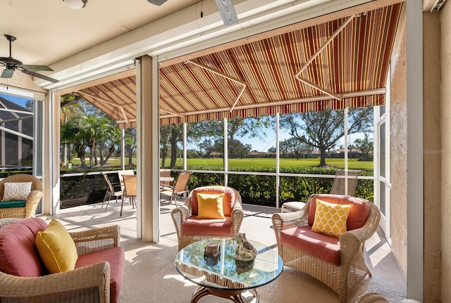 sunroom with ceiling fan and plenty of natural light