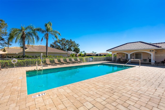 view of pool featuring a patio