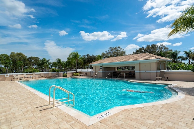 view of pool with a patio