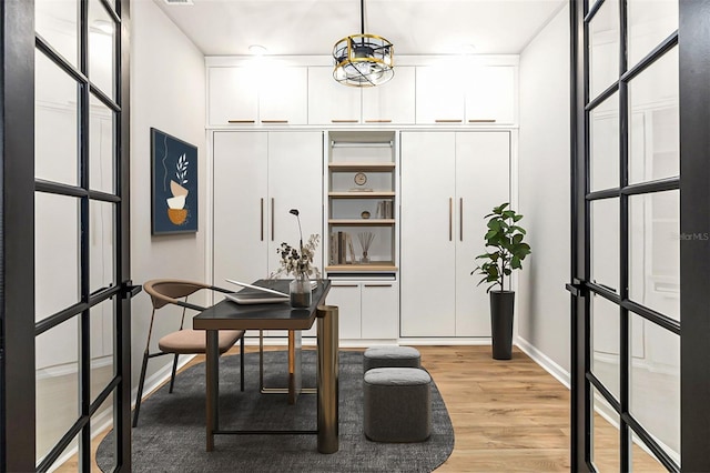 home office featuring light hardwood / wood-style flooring