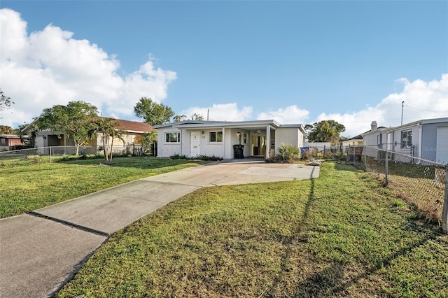 ranch-style home featuring a front yard