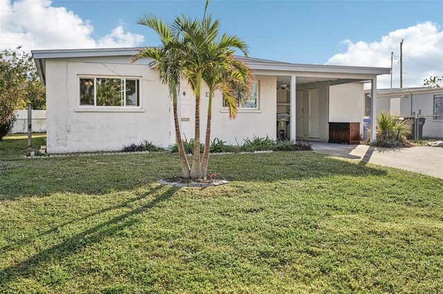 view of front of property with a front lawn