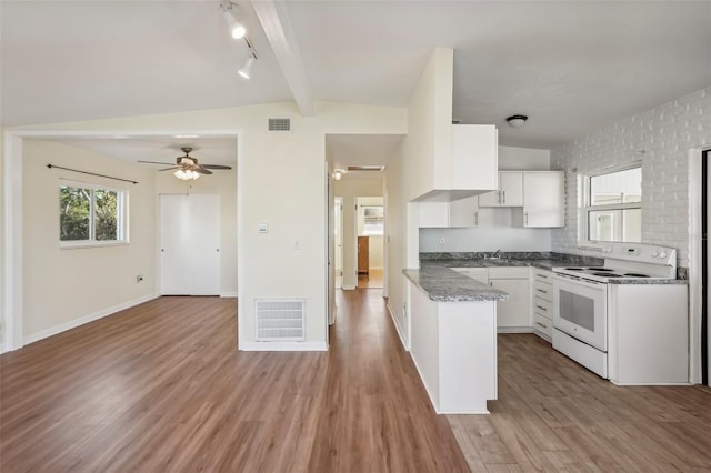 kitchen with white cabinetry, sink, lofted ceiling with beams, white range with electric stovetop, and light hardwood / wood-style floors