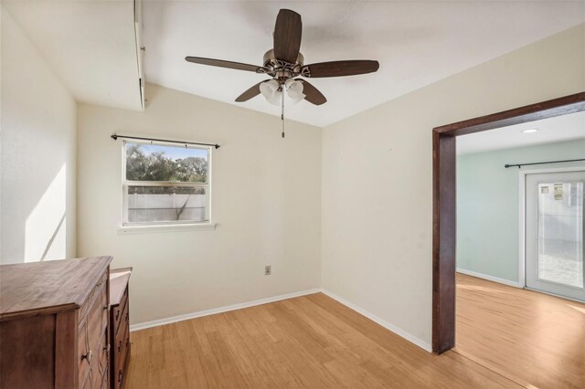 unfurnished room with light hardwood / wood-style floors and ceiling fan