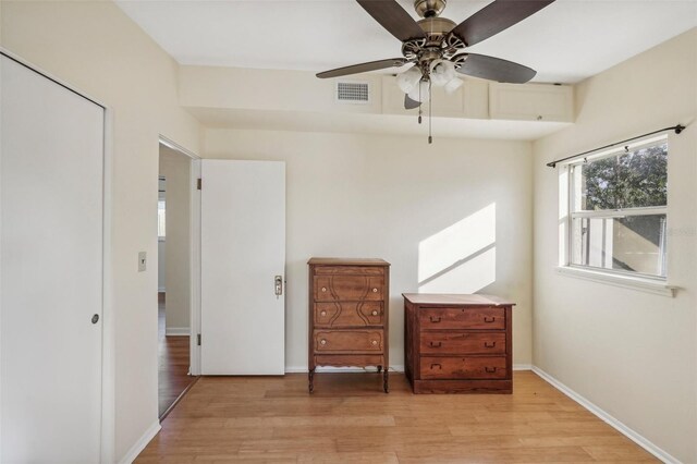 bedroom featuring light hardwood / wood-style floors and ceiling fan