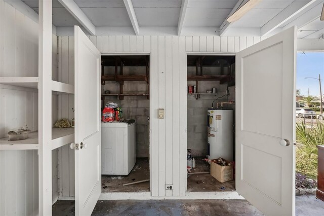 interior space featuring independent washer and dryer and water heater