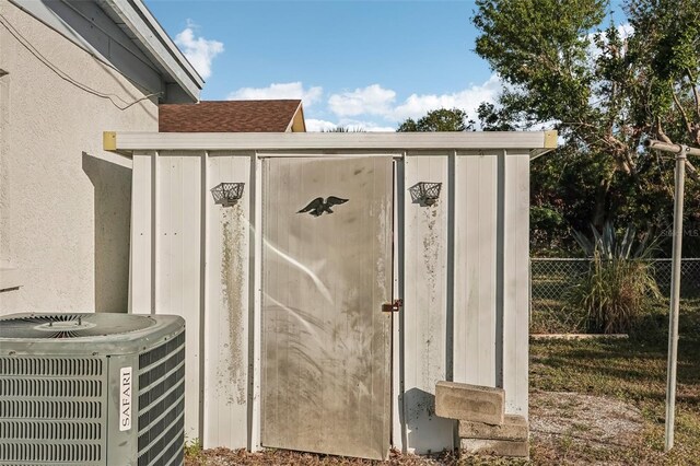 view of outdoor structure featuring central AC unit