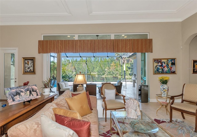 living room featuring plenty of natural light and ornamental molding