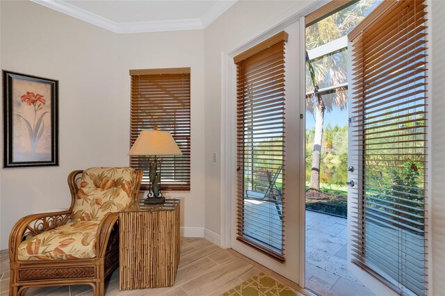 doorway to outside with ornamental molding