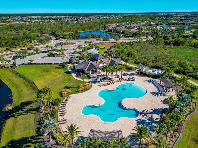 view of swimming pool with a water view