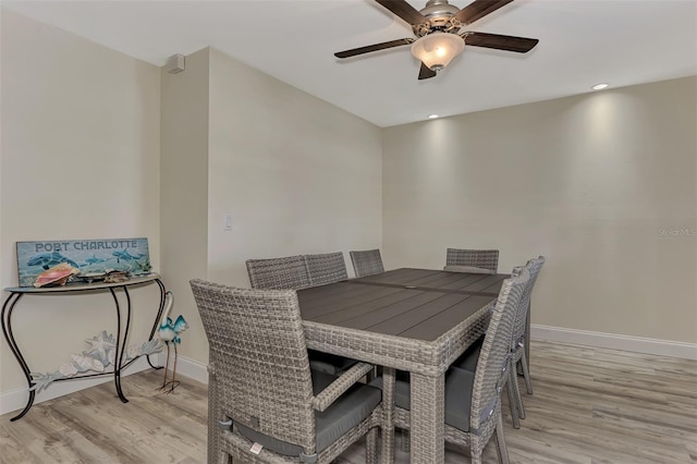 dining space featuring ceiling fan and light hardwood / wood-style floors