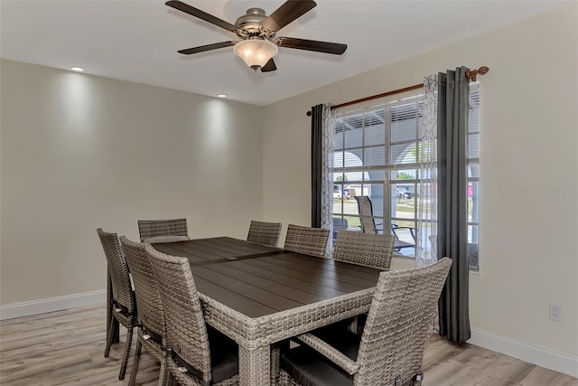 dining area featuring ceiling fan and light hardwood / wood-style floors