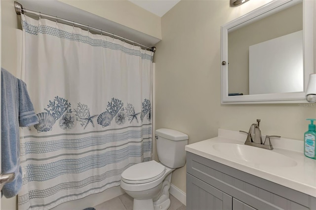 bathroom with tile patterned floors, vanity, toilet, and a shower with curtain