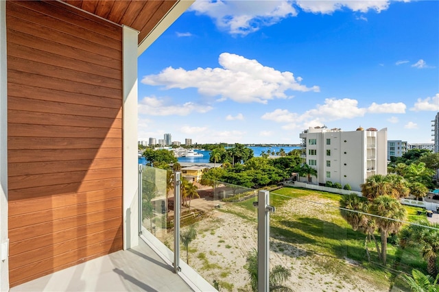 balcony featuring a water view