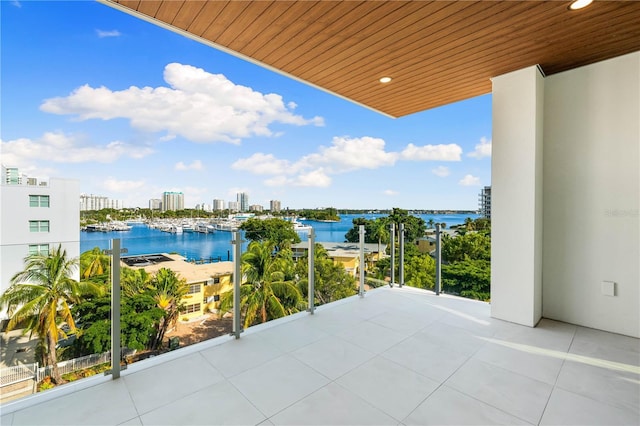 balcony featuring a water view