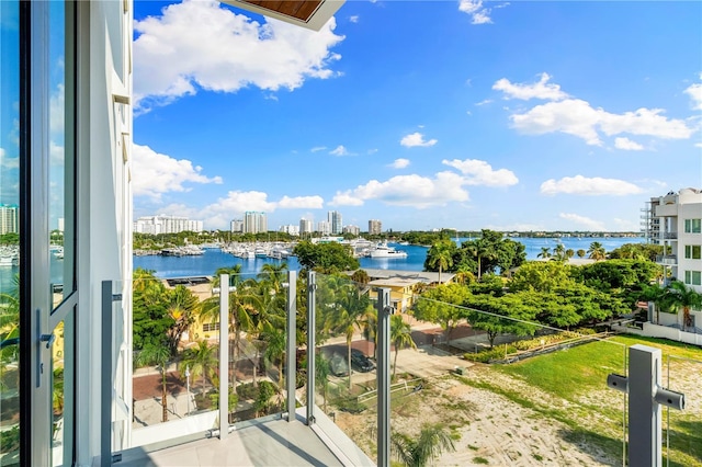 balcony featuring a water view