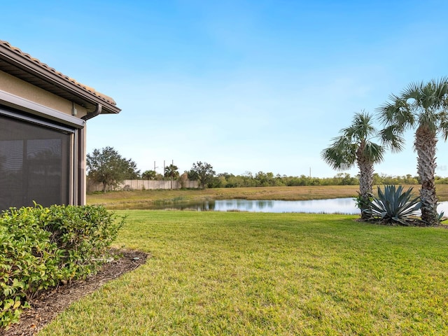 view of yard featuring a water view