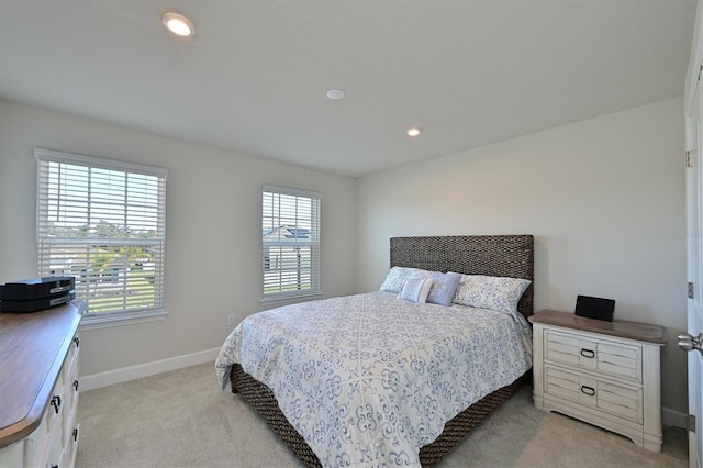 bedroom with light carpet